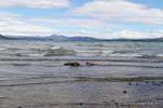 Onde sulla spiaggia, Ushuaia Lago Yehuin, Argentina.