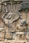 Mangiatore di spade, bassorilievo, Terrazza del Re lebbroso, Angkor Thom, Cambogia.