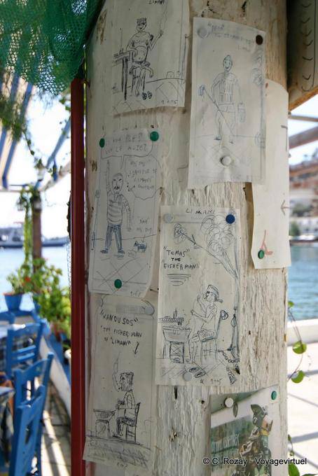 Cartoons on the tronco d'albero, Loutro - Creta, Grecia