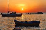 Milos, Pollonia, barche al tramonto, Grecia.