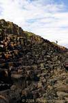 Salite sui gradini basaltici, Giants Causeway, Irlanda de Nord.