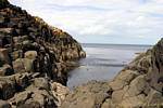 Colonne Lava immersi nel mare, Giants Causeway, Irlanda de Nord.