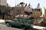 Profusione di antenne paraboliche sui tetti, Amman, Giordania.