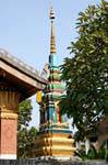 Piccolo stupa verniciato, Wat Sene Soukharam, Luang Prabang, Laos.