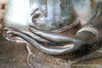 Dettaglio della mano di Buddha in bronzo, Wat Ho Phra Kaew, Vientiane, Laos.