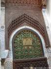 Top della porta di legno intagliato con muqarnas arco, Fes, Marocco.