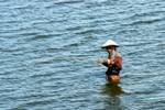 Angler in Lake Taungthaman, Mandalay, Birmania.