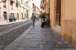 Bosa, Corso Vittorio Emanuele II, gli anziani e gli ciottoli, Sardegna.