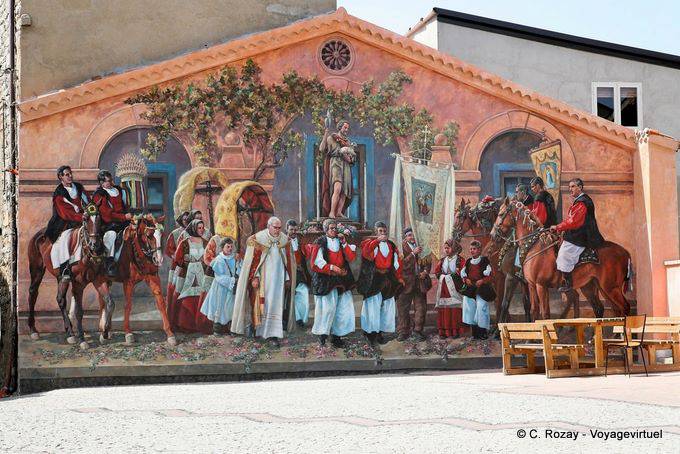 Fonni, Piazza Parrocchia, scena processione religiosa, murale - Sardegna
