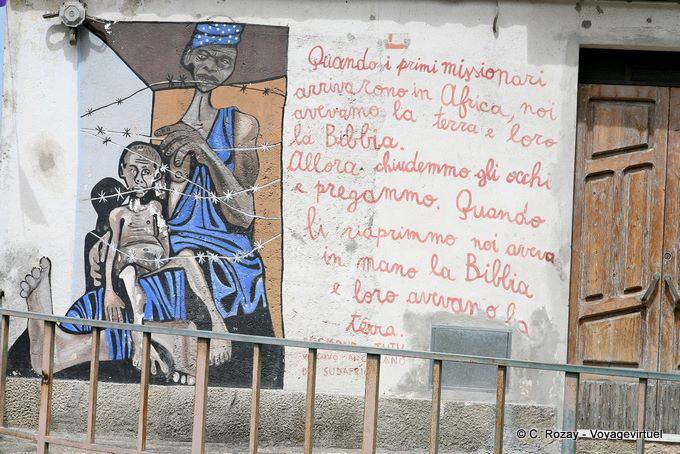 Orgosolo, carestia in Africa, Bibbia e missionaria, murale - Sardegna