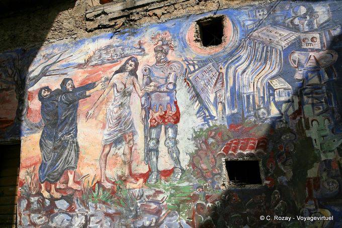Orgosolo, tra la splendida armatura e la religione, murale - Sardegna