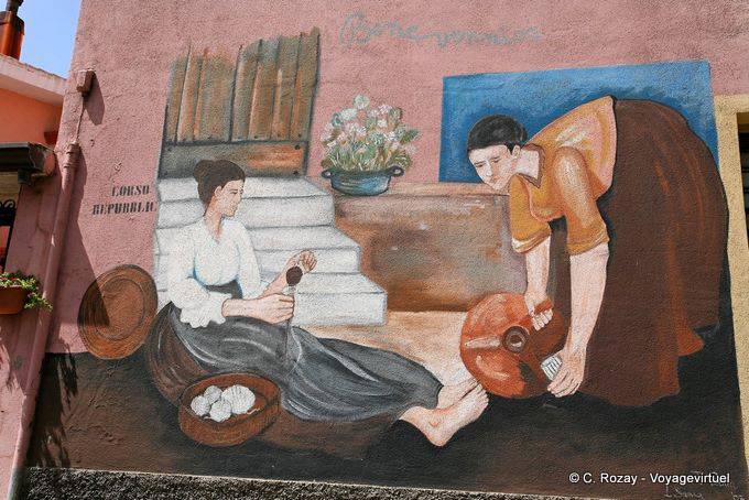 Orgosolo, il filatore e il portatore d'acqua, Corso Repubblica, murale - Sardegna