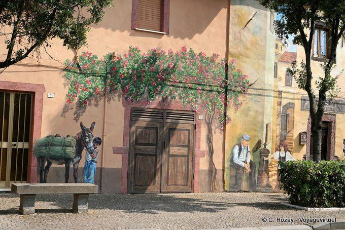 Tinnura, asino in panchina, murale - Sardegna