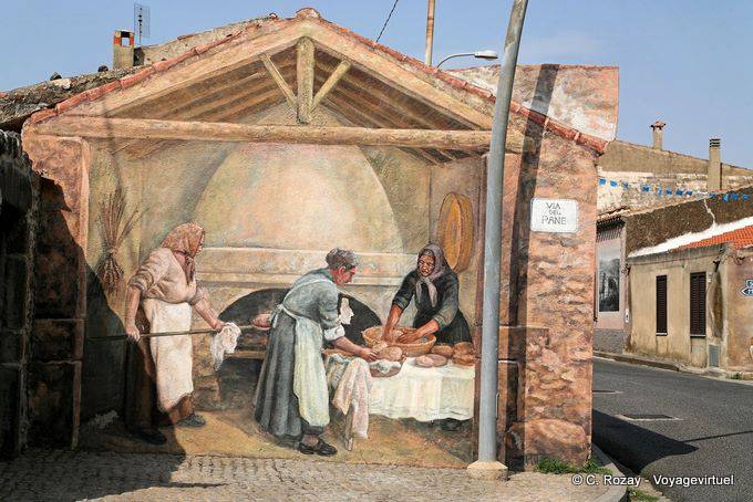 Tinnura, produzione del pane da parte delle donne, Via del Pane, murale - Sardegna