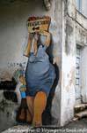 Orgosolo, Consultorio, indicazione all'angolo di Corso Repubblica, murale, Sardegna.