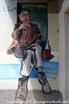 Orgosolo, doppio sapore omaggio a C. Bore, satirico, murale, Sardegna.
