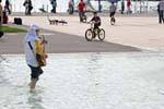 Il chitarrista con i piedi nell'acqua, Ouchy, La Svizzera.
