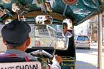 Conducente di risciò, Chiang Mai, La Tailandia.