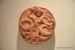 Kerkuane, Museo, pezzo rotondo di terracotta che rappresenta la Medusa o il Hydra, Tunisia.